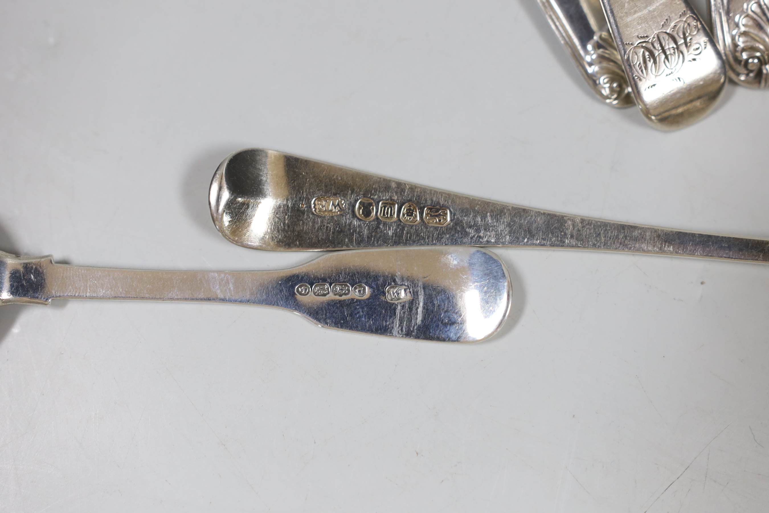 Five assorted George III and later silver sauce ladles, various patterns, dates and makers and four late George III fiddle, thread and shell mustard ladles, 12.1oz.